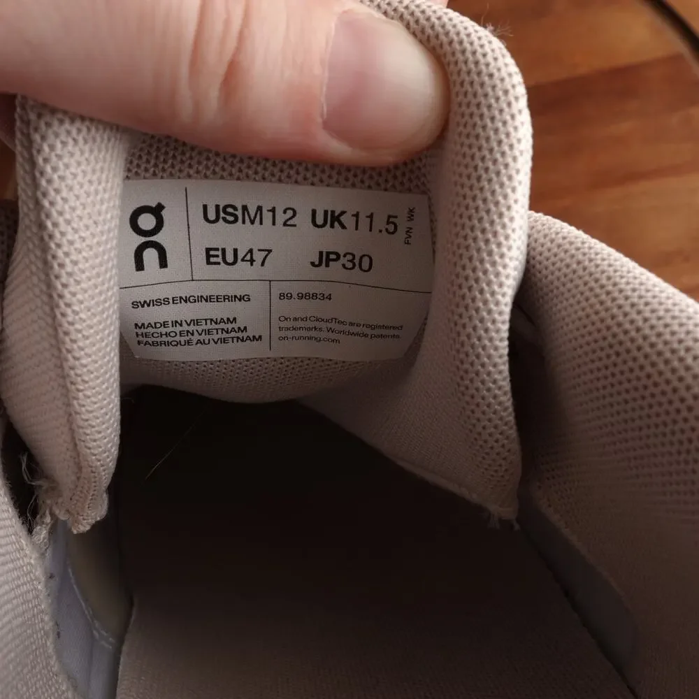 On Running Men's Athletic Shoes in White and Black
